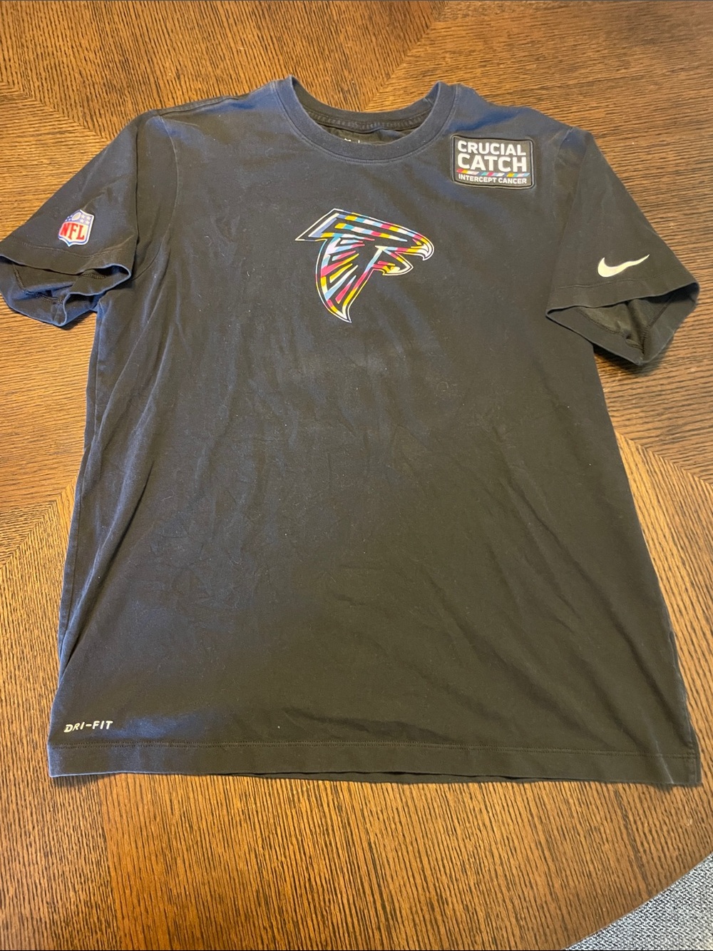 Nike Men’s Black Atlanta Falcons Crucial Catch Logo Tee (cancer addition)